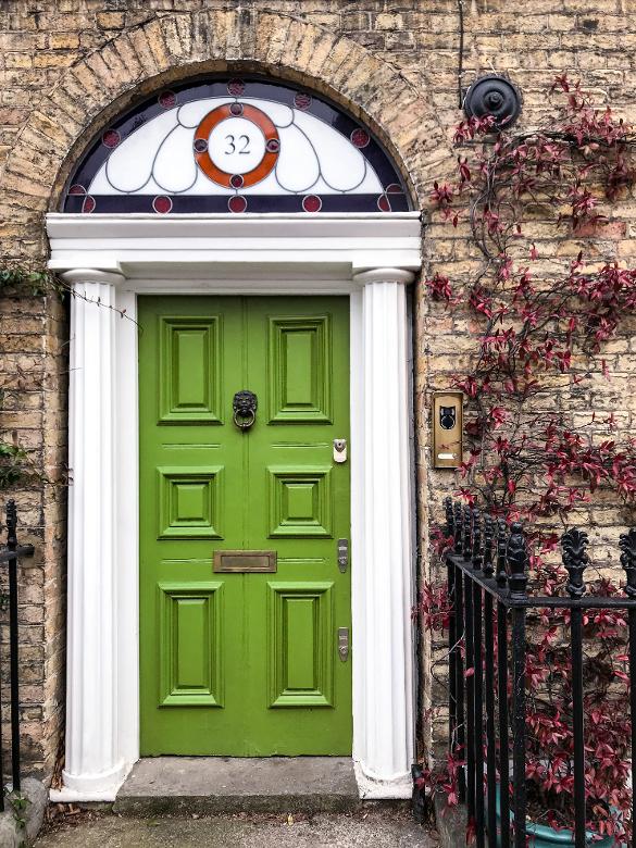 Green doorway A Road to Ruin Walk - discover the relationship of Londoners and their alcohol